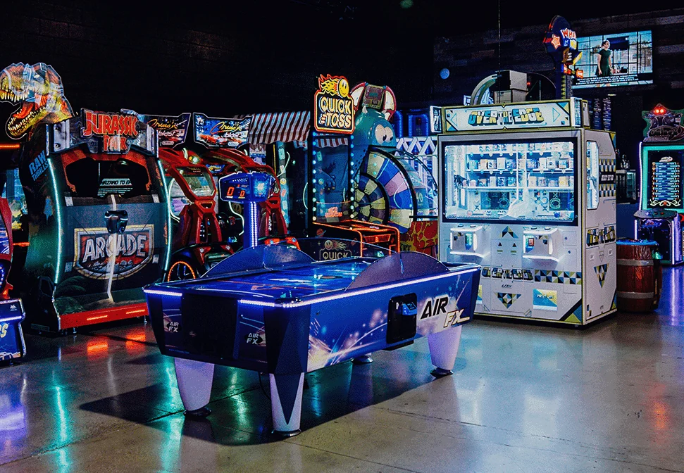 Arcade games and air hockey inside Amped Arcade at Nitro City Racing Fairfield