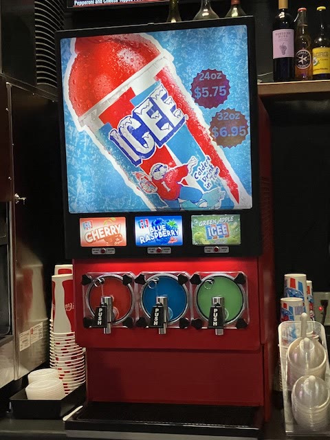 The ICEE machine at Nitro Cafe Fairfield with cherry, blue raspberry, and green apple flavors